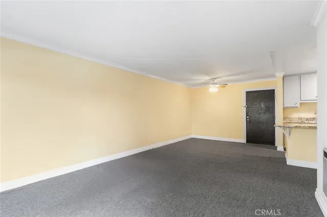 a view of empty room with washer and dryer