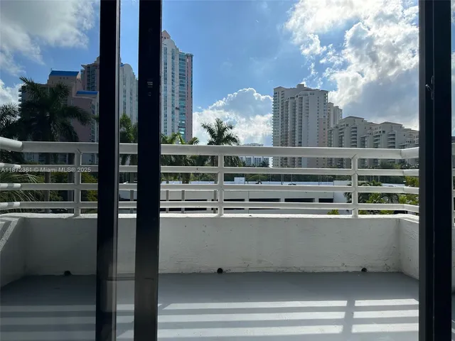 a kitchen with stainless steel appliances a sink stove and refrigerator