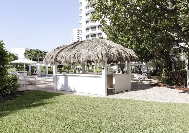 a view of a room with lots of gym equipment