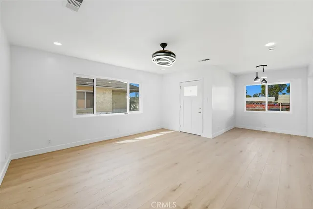 an empty room with windows