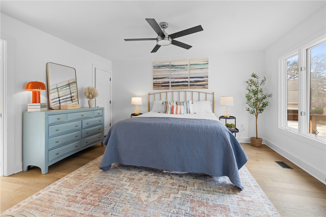 117 Riverpoint Drive Clemson, SC 29631 - Photo 22 of 47 This tranquil bedroom offers comfort and a bright atmosphere for peaceful living.