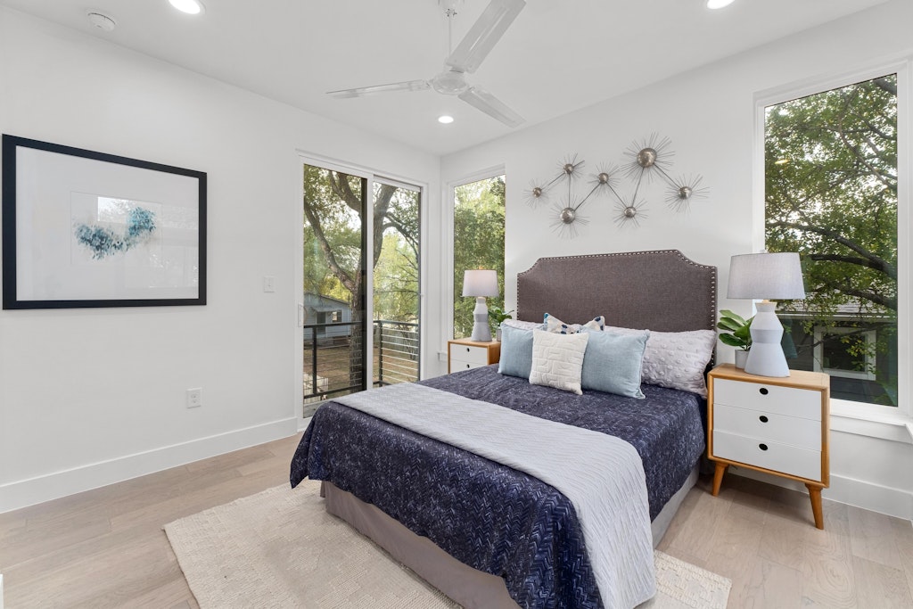2909 East 13th Street, Unit 2 Austin, TX 78702 - Photo 11 of 23 Bedroom with light wood-type flooring, recessed lighting, ceiling fan, and access to outside