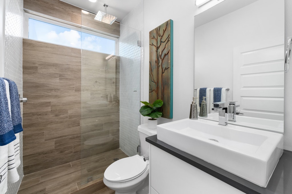 2909 East 13th Street, Unit 2 Austin, TX 78702 - Photo 13 of 23 Bathroom featuring walk in shower and vanity