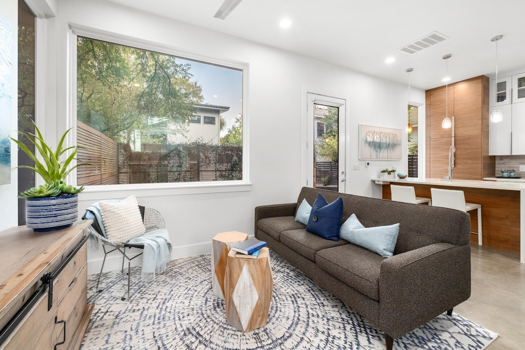 2909 East 13th Street, Unit 2 Austin, TX 78702 - Photo 4 of 23 Living room with recessed lighting and finished concrete floors