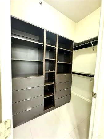 a room with closet and a window