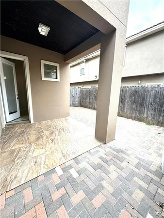 a view of backyard of a house