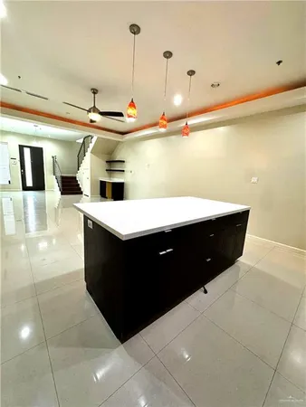 a bathroom with a sink vanity and mirror