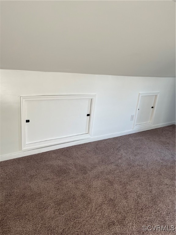 20020 Frog Level Road Ruther Glen, VA 22546 - Photo 12 of 32 Bonus room with carpet and vaulted ceiling