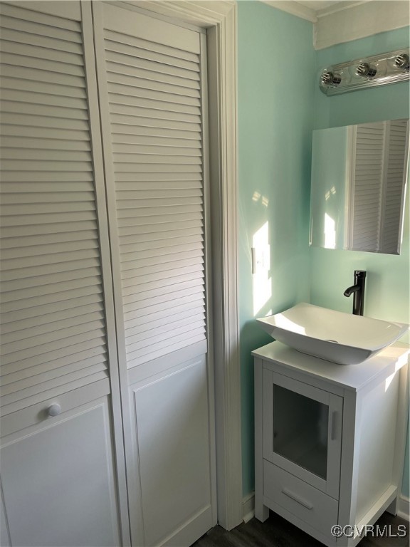 20020 Frog Level Road Ruther Glen, VA 22546 - Photo 15 of 32 Bathroom with vanity and wood-type flooring