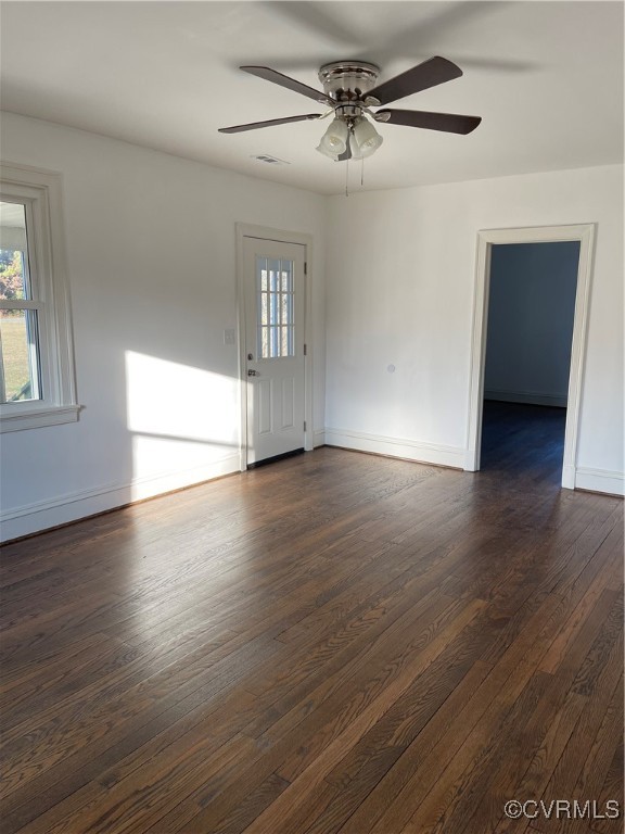 20020 Frog Level Road Ruther Glen, VA 22546 - Photo 2 of 32 Unfurnished room featuring ceiling fan and dark ha