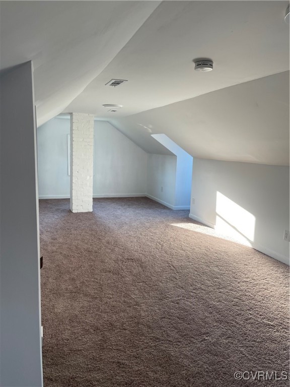 20020 Frog Level Road Ruther Glen, VA 22546 - Photo 32 of 32 Bonus room with dark carpet and vaulted ceiling