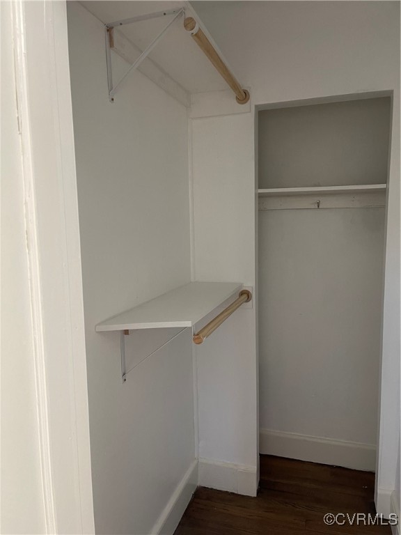 20020 Frog Level Road Ruther Glen, VA 22546 - Photo 5 of 32 Walk in closet with dark wood-type flooring