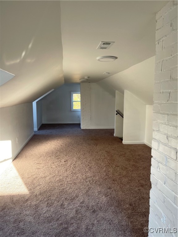 20020 Frog Level Road Ruther Glen, VA 22546 - Photo 10 of 32 Additional living space with dark carpet and lofte
