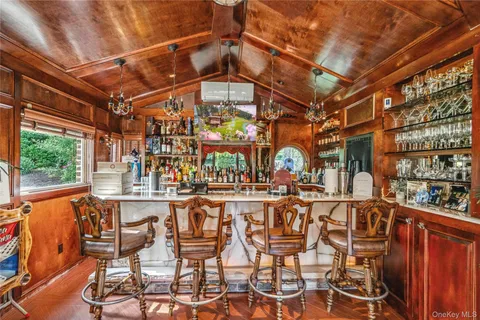 a view of a chairs and table in a patio