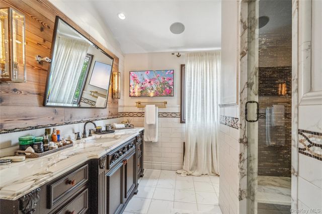 a kitchen with a sink stove and refrigerator
