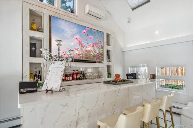 a view of a livingroom with furniture and toys