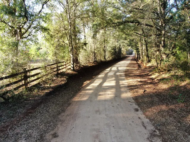a view of street with parked cars