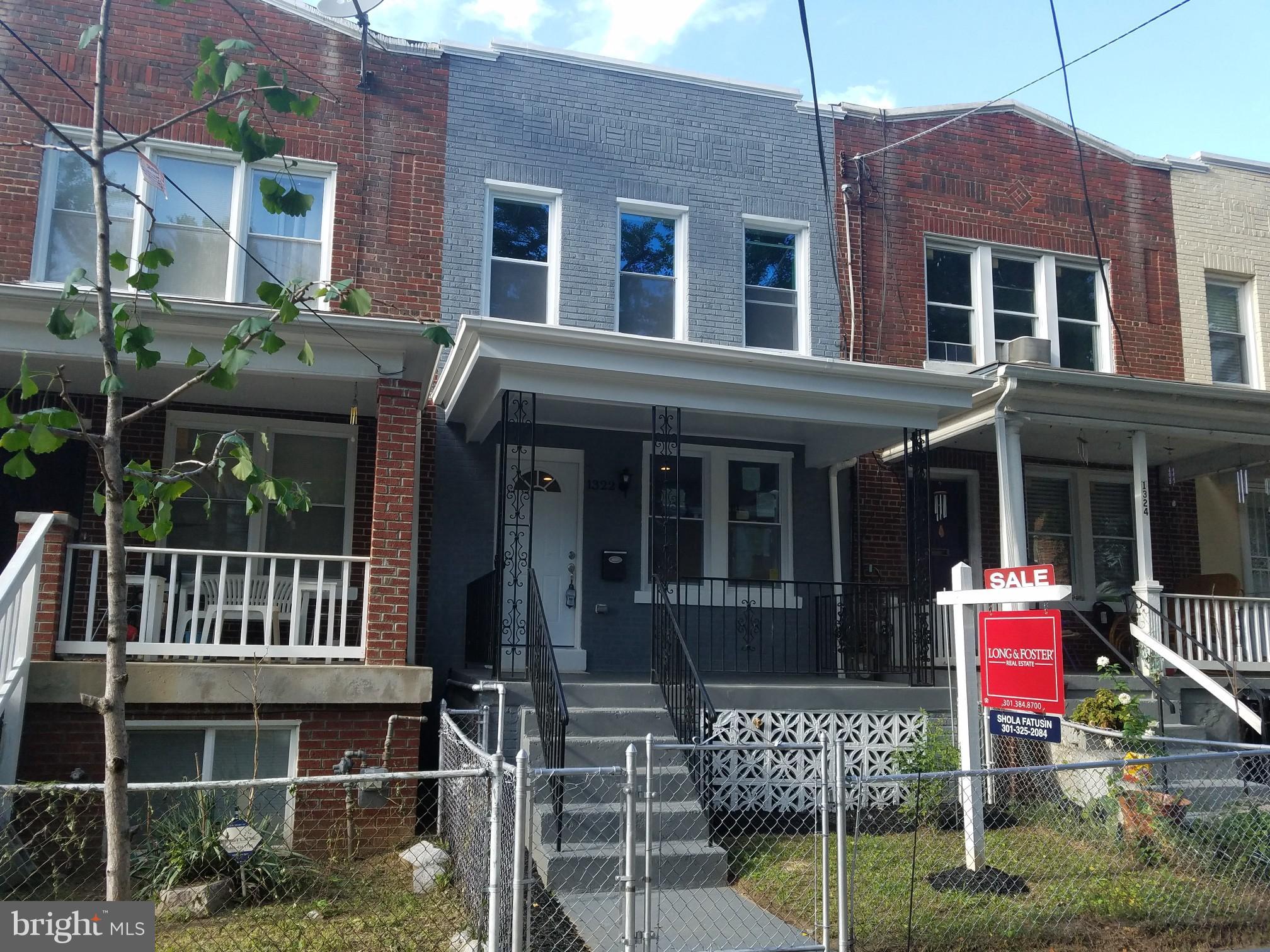 1322 Ridge Place Southeast Washington, DC 20020 - Photo 1 of 23 a front view of a house with porch