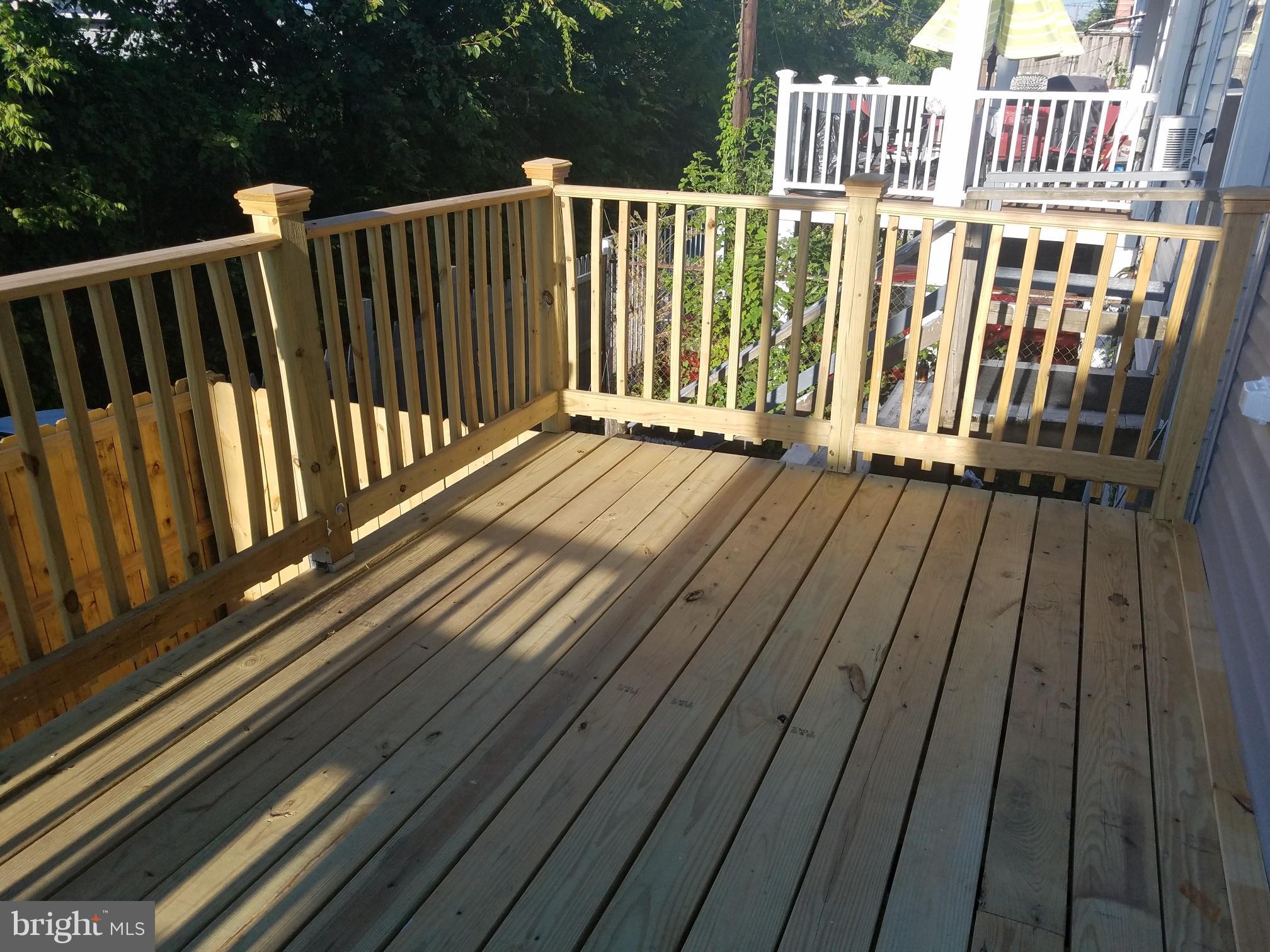 1322 Ridge Place Southeast Washington, DC 20020 - Photo 22 of 23 a view of deck with barbeque grill and wooden fence