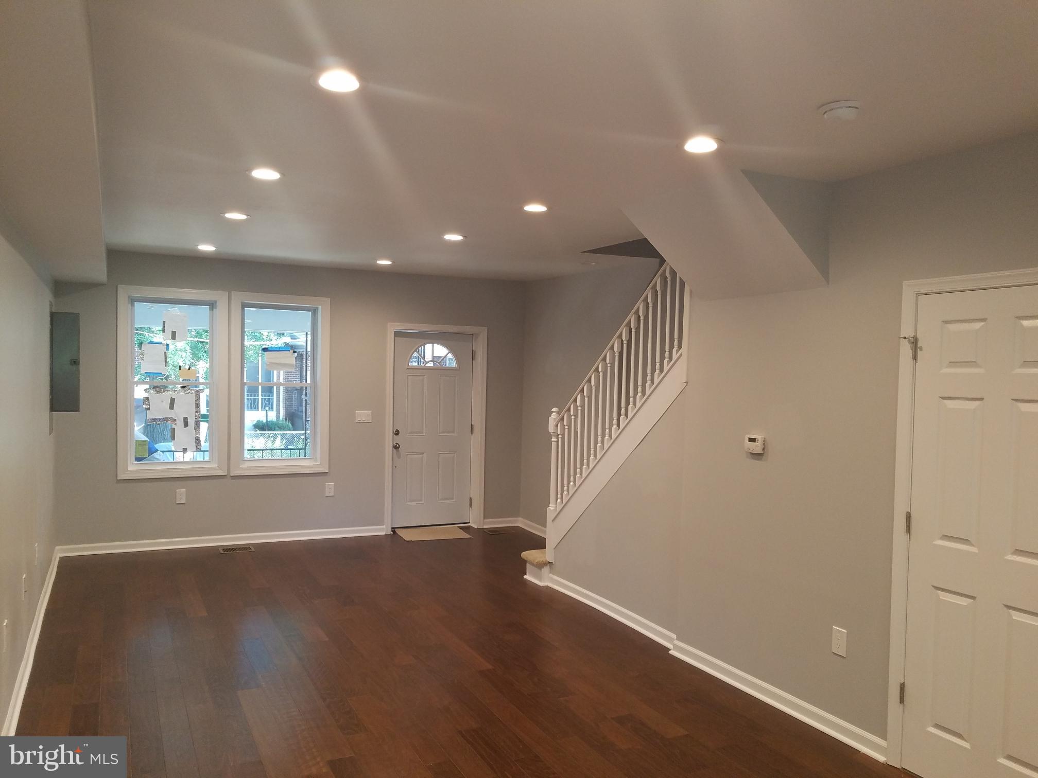 1322 Ridge Place Southeast Washington, DC 20020 - Photo 23 of 23 a view of livingroom and hall with wooden floor
