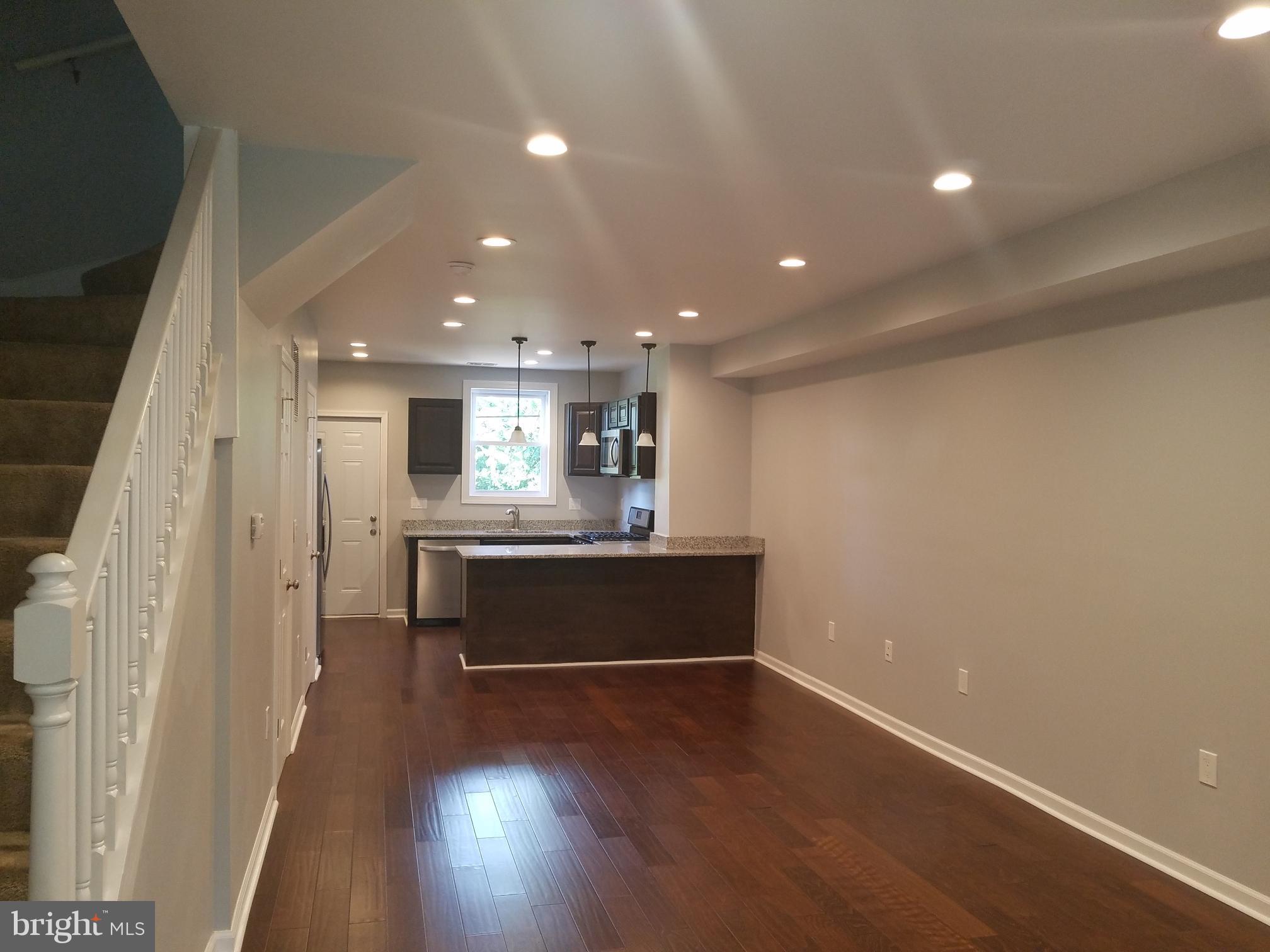 1322 Ridge Place Southeast Washington, DC 20020 - Photo 6 of 23 a view of cabinets and wooden floor