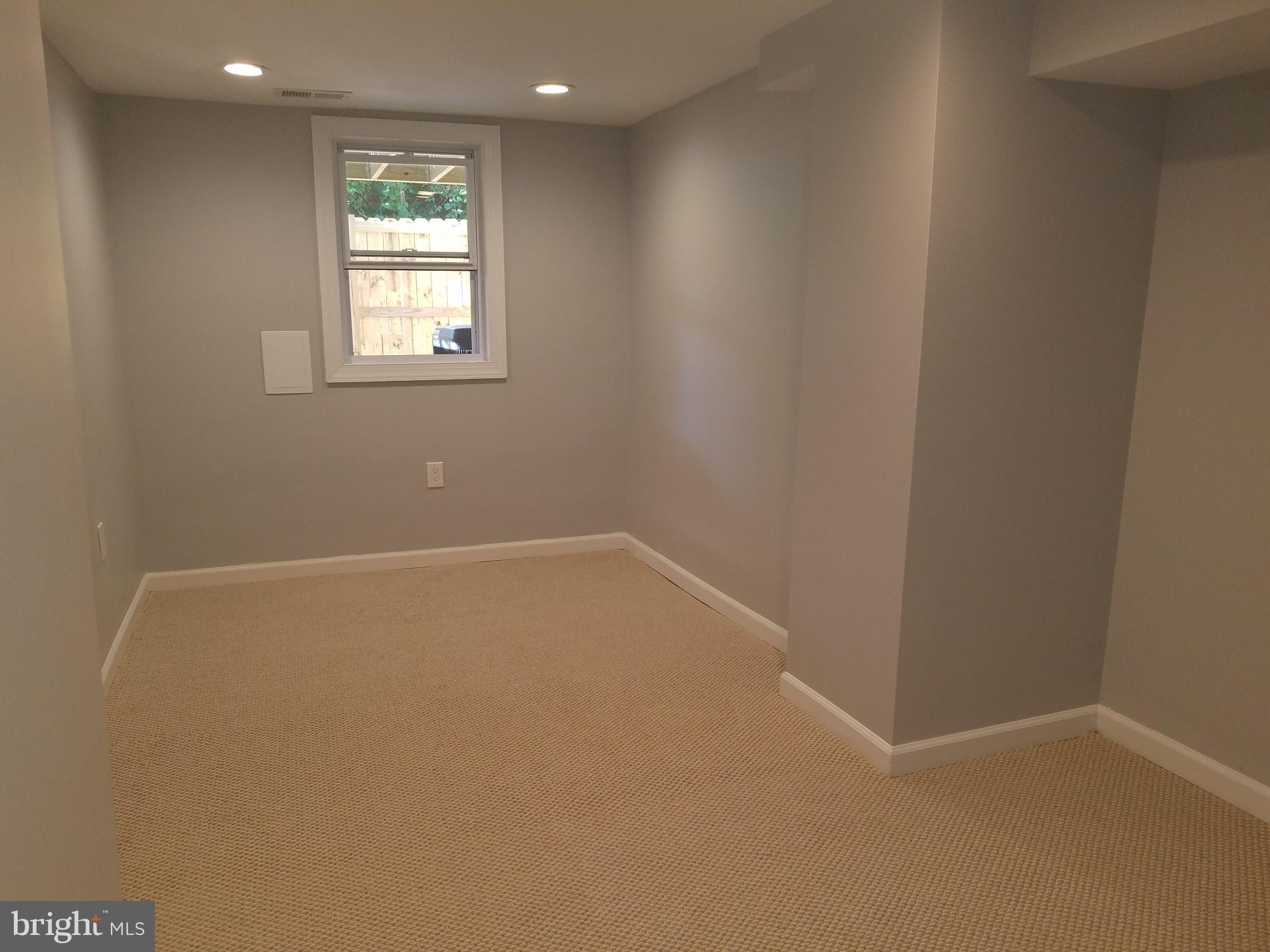 1322 Ridge Place Southeast Washington, DC 20020 - Photo 9 of 23 an empty room with a window