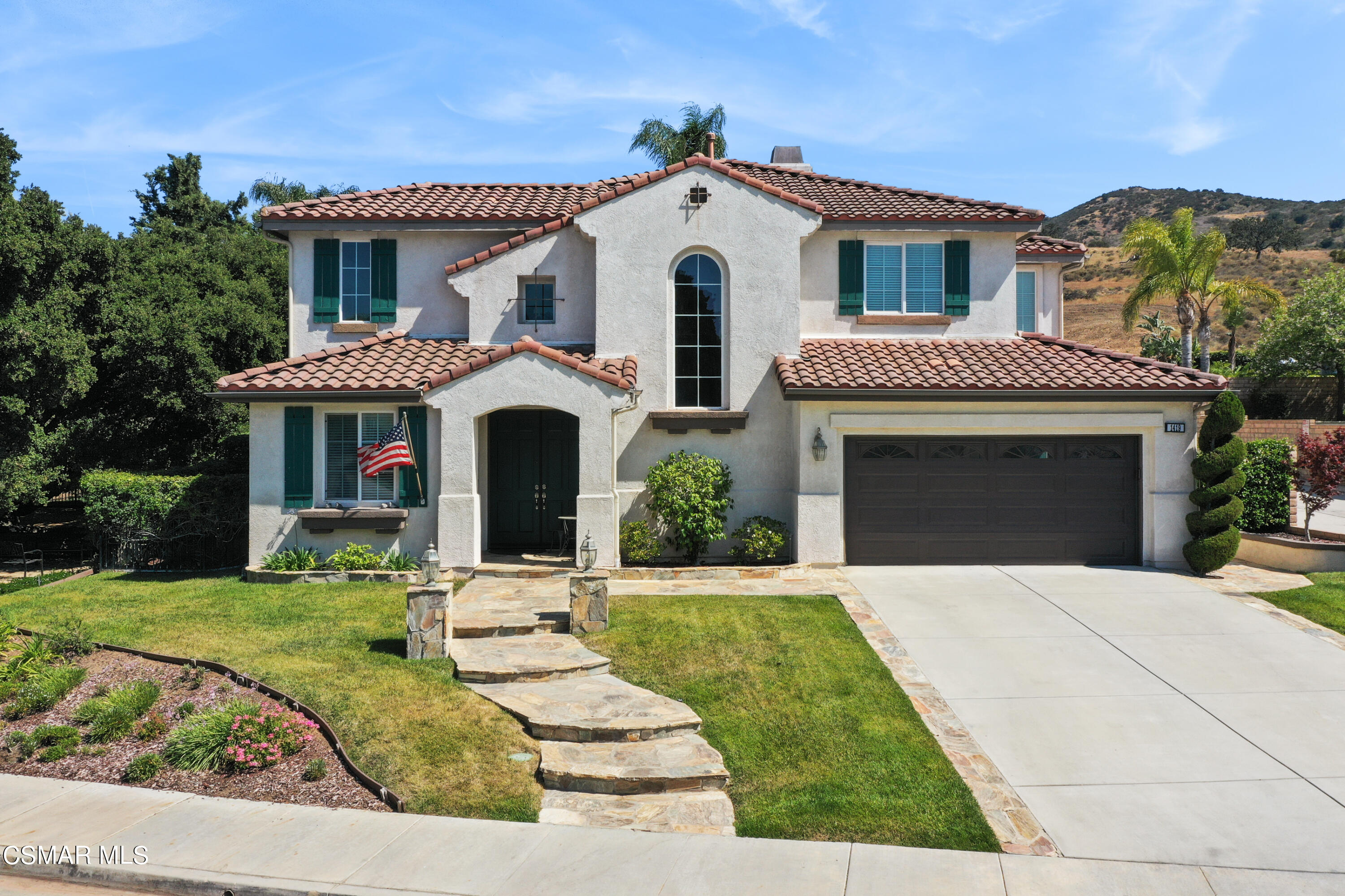 1419 Hidden Ranch Drive Simi Valley, CA 93063 - Photo 1 of 50 a front view of a house with a yard