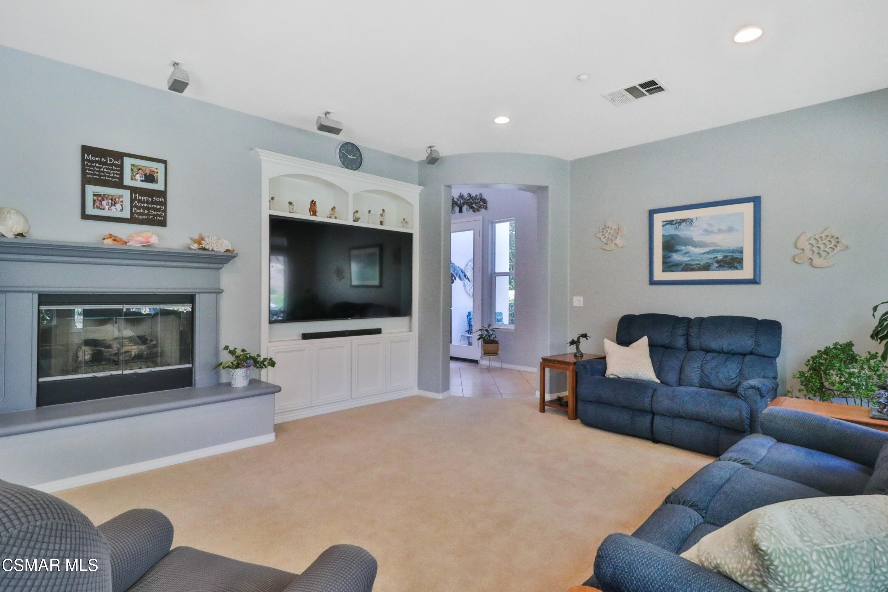 1419 Hidden Ranch Drive Simi Valley, CA 93063 - Photo 11 of 50 a living room with furniture and a flat screen tv