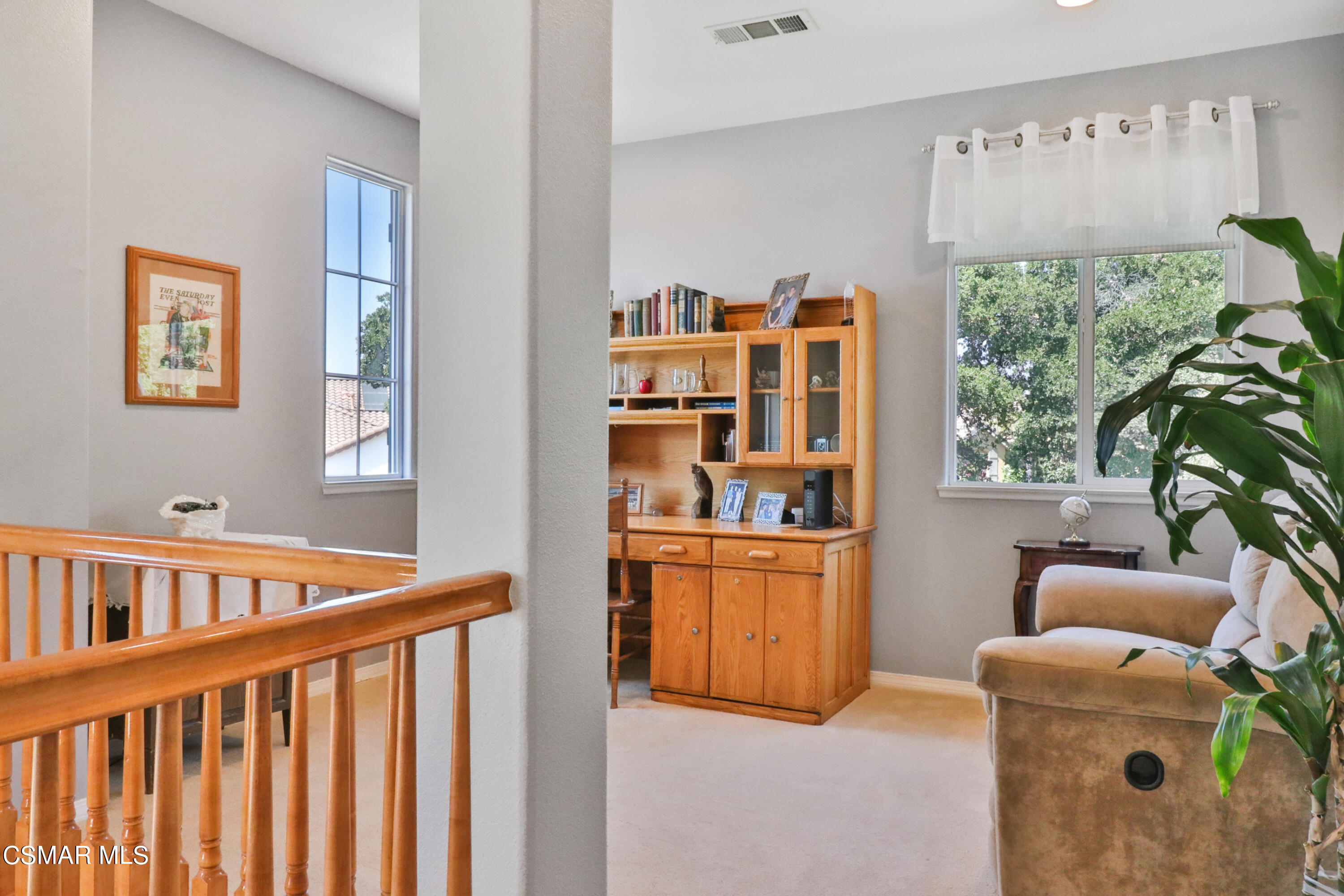 1419 Hidden Ranch Drive Simi Valley, CA 93063 - Photo 22 of 50 a room with furniture a window and book shelf