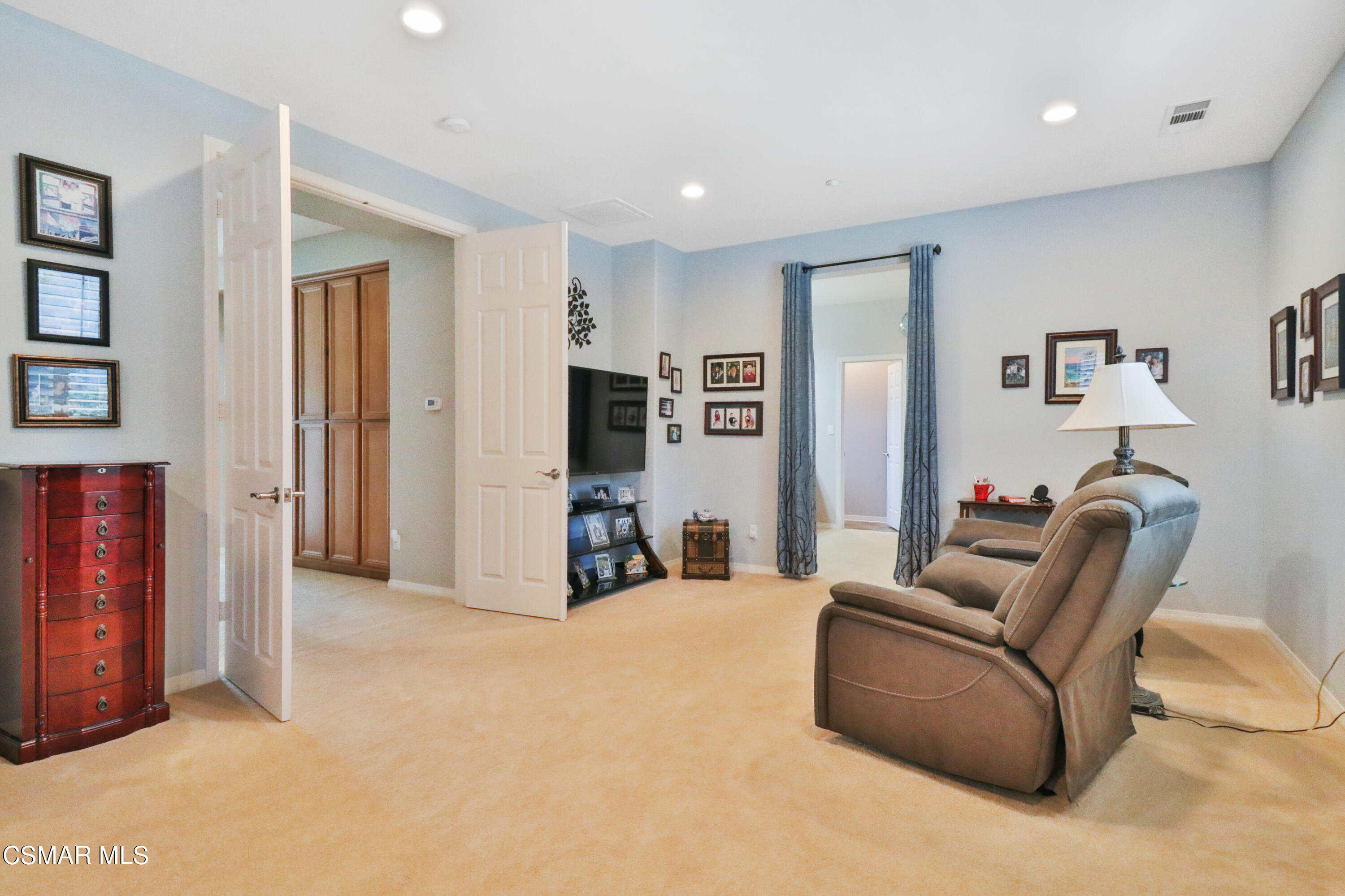 1419 Hidden Ranch Drive Simi Valley, CA 93063 - Photo 29 of 50 a living room with furniture and a flat screen tv