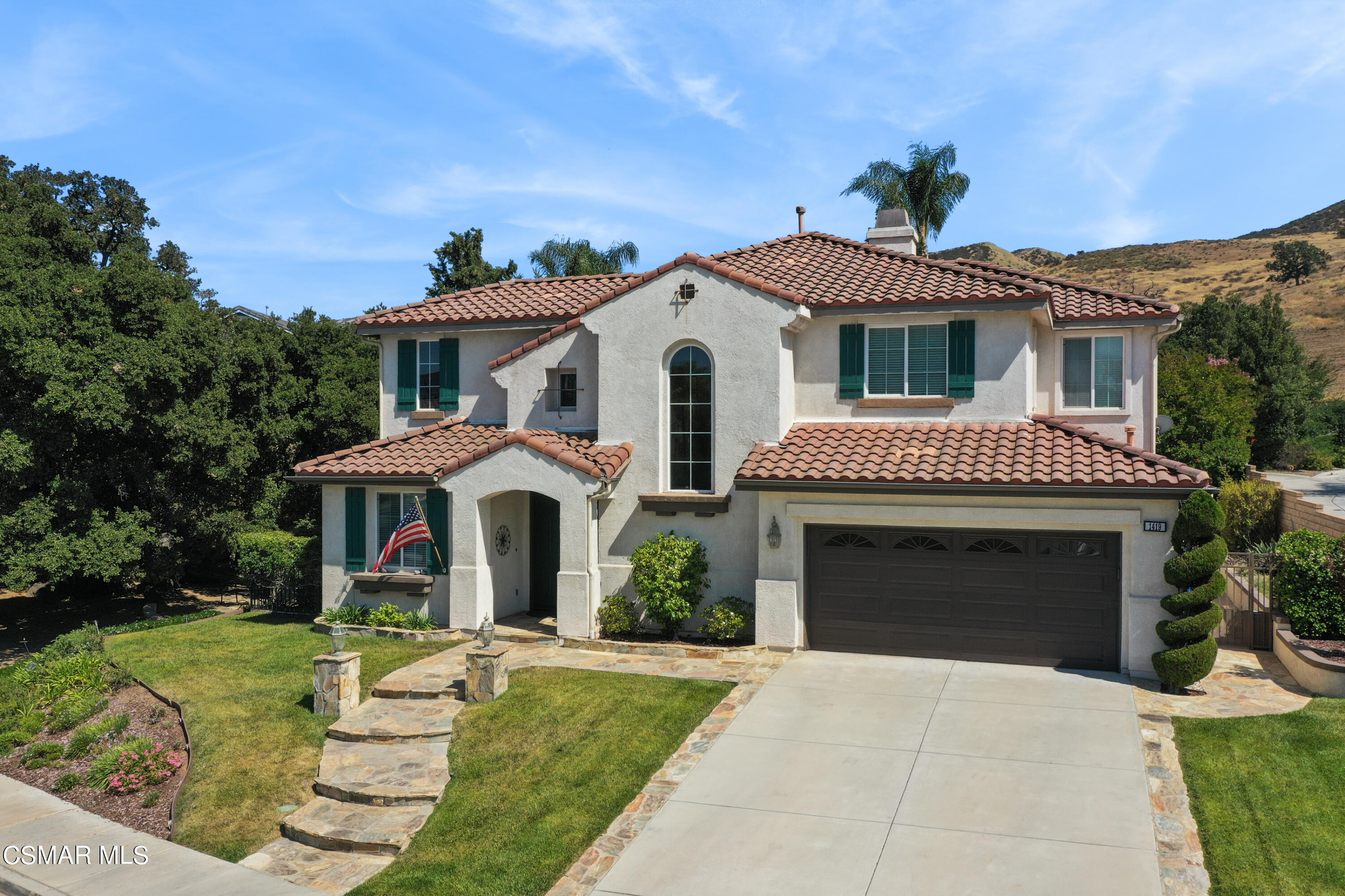 1419 Hidden Ranch Drive Simi Valley, CA 93063 - Photo 3 of 50 a front view of a house with a yard
