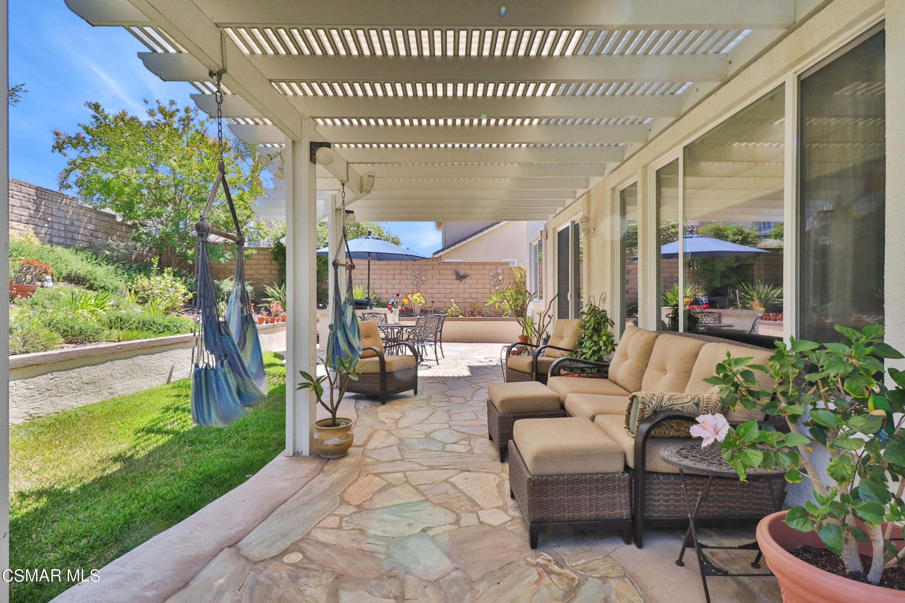 1419 Hidden Ranch Drive Simi Valley, CA 93063 - Photo 39 of 50 a balcony with furniture and a garden