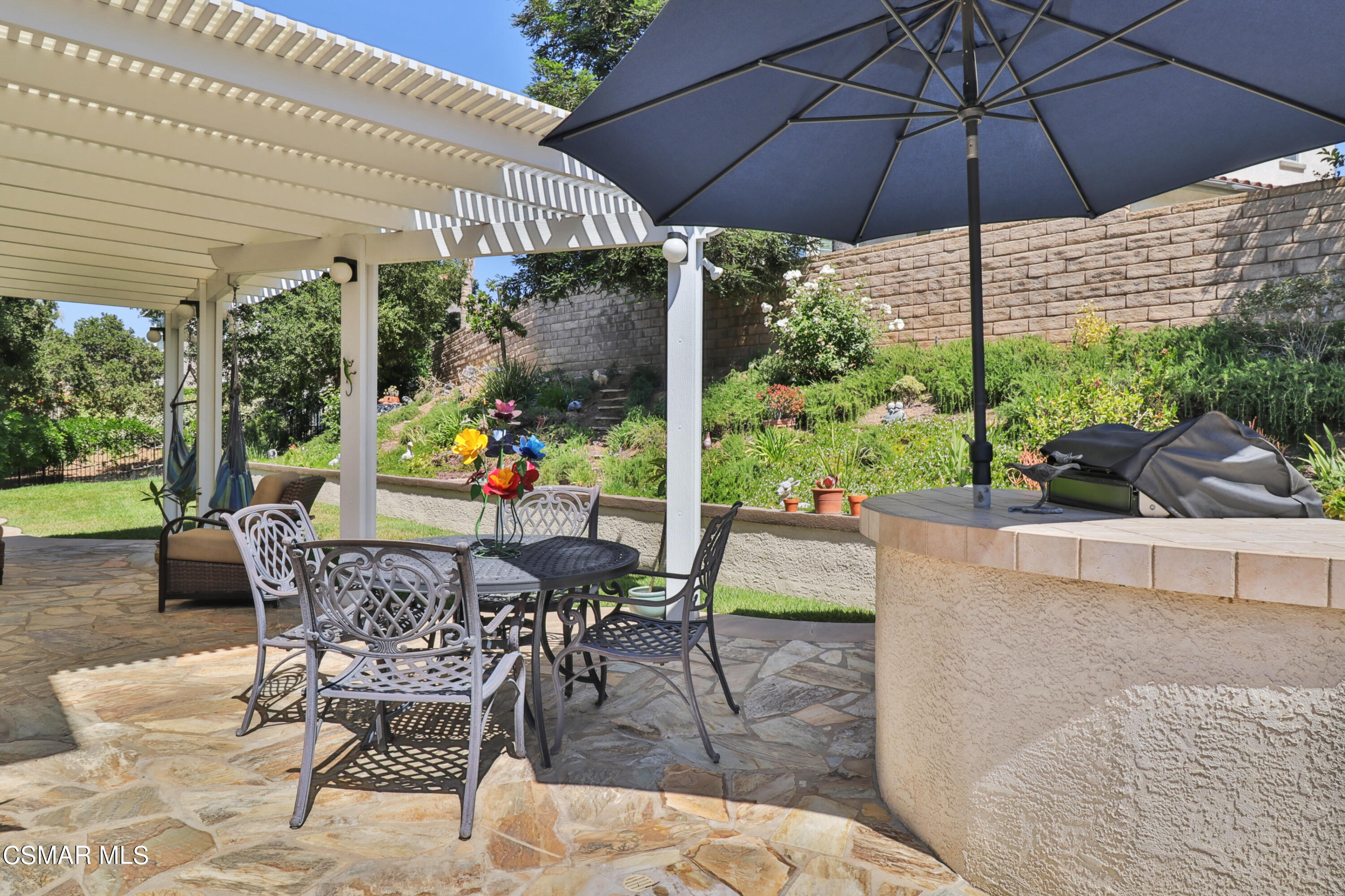 1419 Hidden Ranch Drive Simi Valley, CA 93063 - Photo 40 of 50 a view of an outdoor sitting area with furniture and backyard