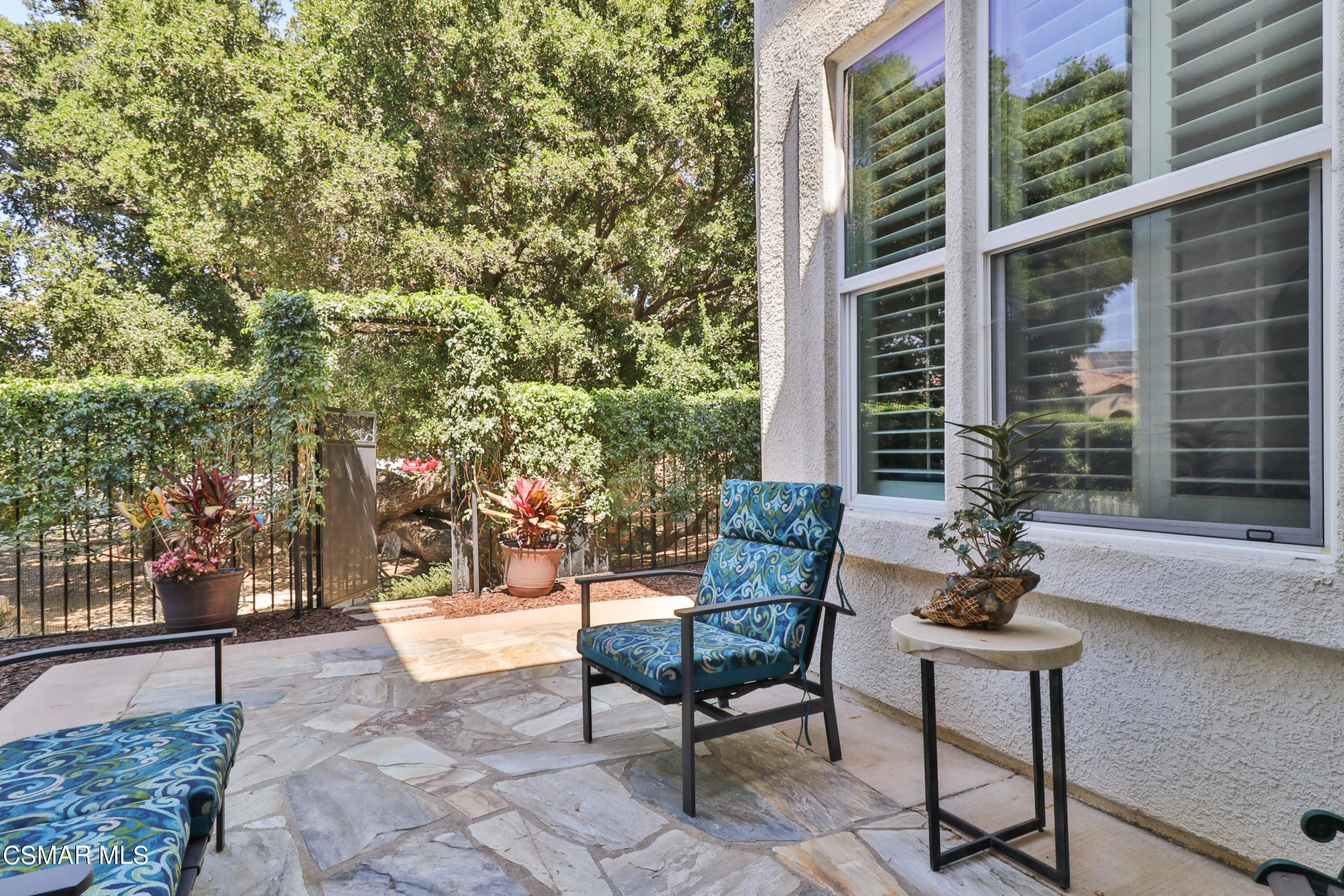 1419 Hidden Ranch Drive Simi Valley, CA 93063 - Photo 42 of 50 a view of a patio with a table and chairs