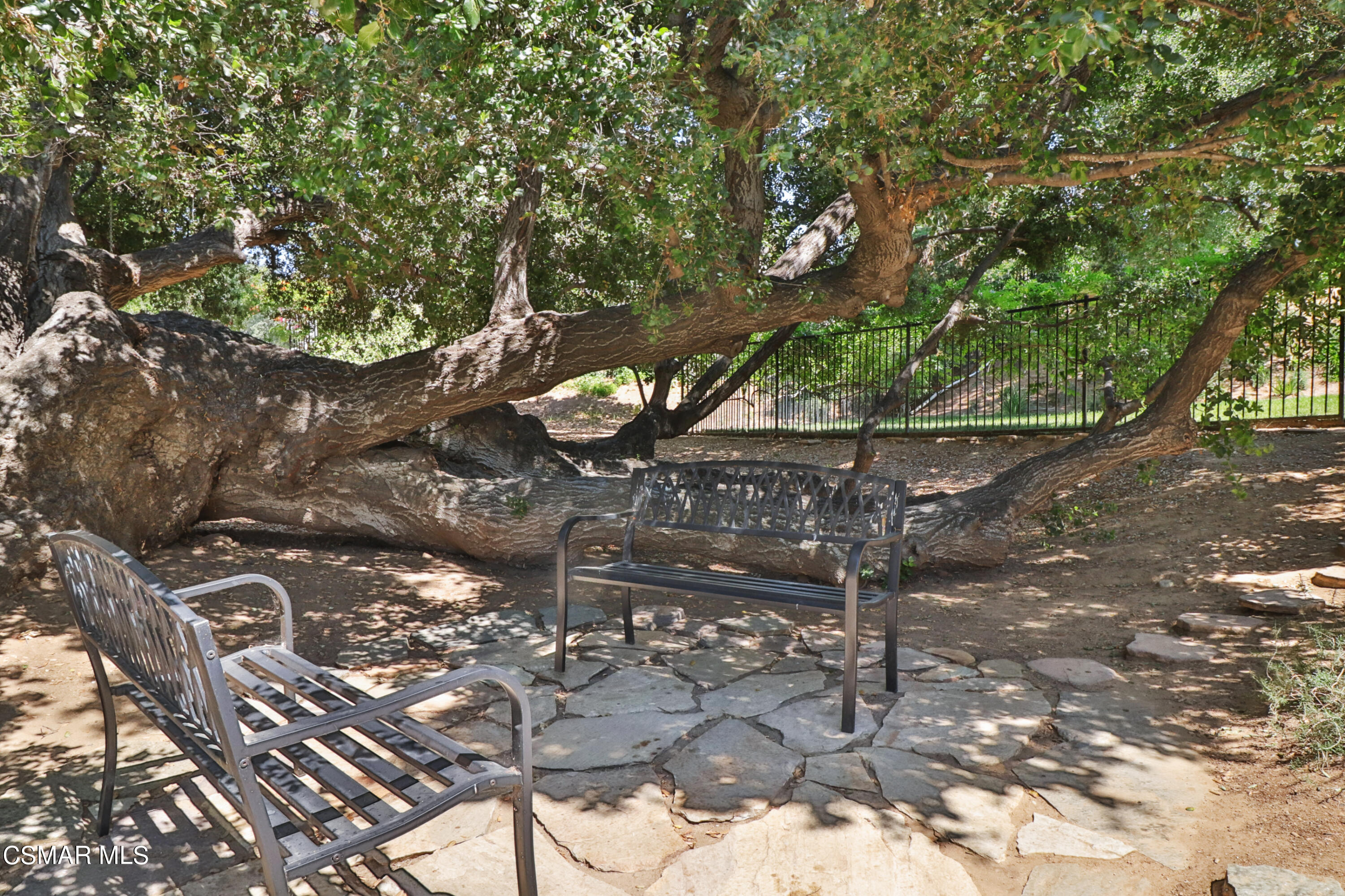 1419 Hidden Ranch Drive Simi Valley, CA 93063 - Photo 44 of 50 a backyard of a house with lots of green space