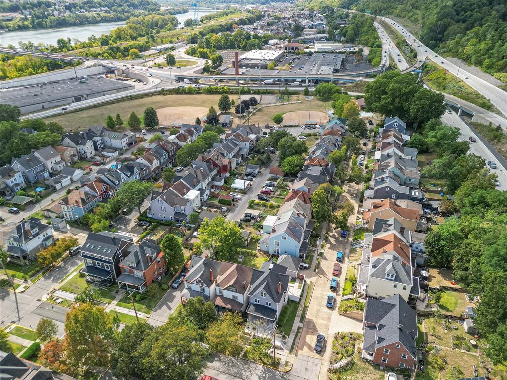 33 5th Street Pittsburgh, PA 15215 - Photo 32 of 32 an aerial view of residential houses with outdoor space and swimming pool