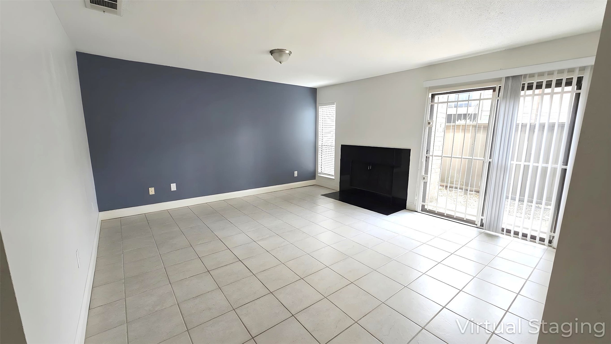 6601 Sands Point Drive, Unit 34 Houston, TX 77074 - Photo 3 of 24 a view of an empty room with window and wooden floor