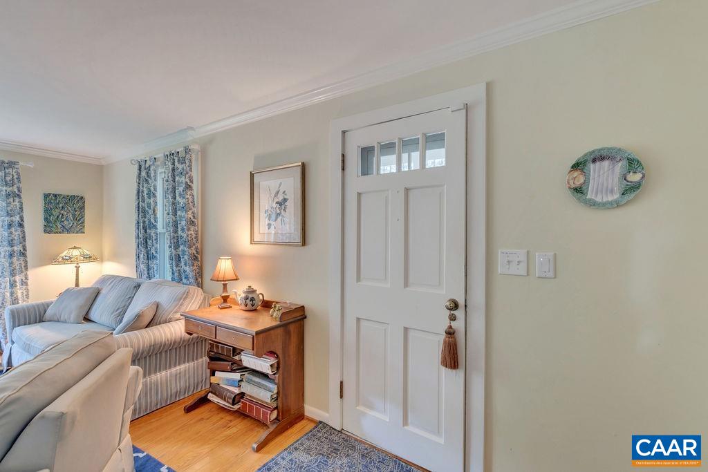 635 Greenwood Road Greenwood, VA 22943 - Photo 15 of 61 a living room with furniture a rug and a window