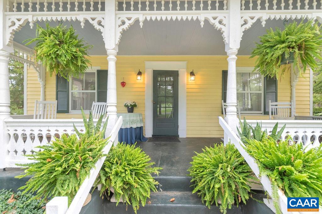 635 Greenwood Road Greenwood, VA 22943 - Photo 2 of 61 a front view of a house with a garden