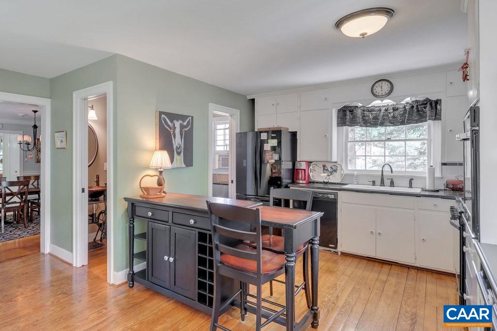 635 Greenwood Road Greenwood, VA 22943 - Photo 22 of 61 a kitchen with stainless steel appliances kitchen island granite countertop a refrigerator and cabinets