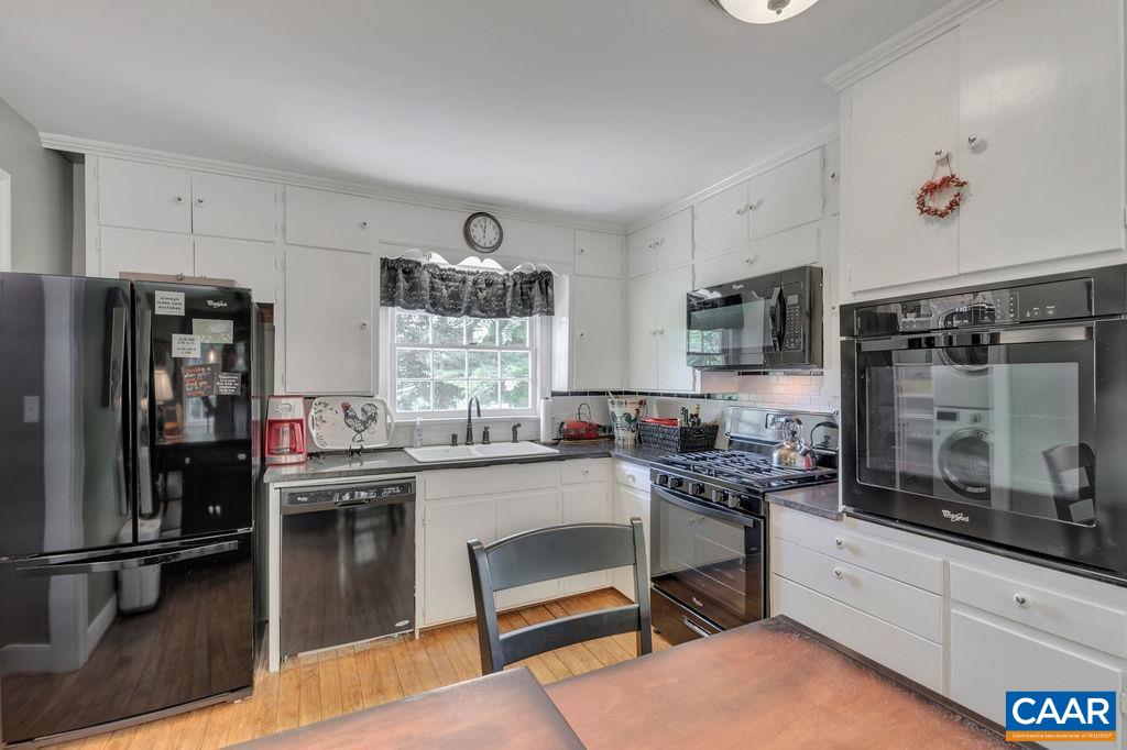 635 Greenwood Road Greenwood, VA 22943 - Photo 23 of 61 a kitchen with a sink stove and cabinets