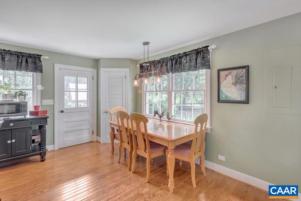 635 Greenwood Road Greenwood, VA 22943 - Photo 28 of 61 a view of a dining room with furniture window and wooden floor