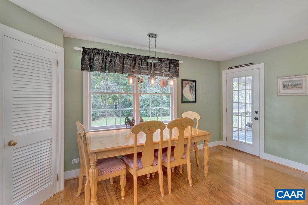 635 Greenwood Road Greenwood, VA 22943 - Photo 29 of 61 a view of a dining room with furniture window and wooden floor