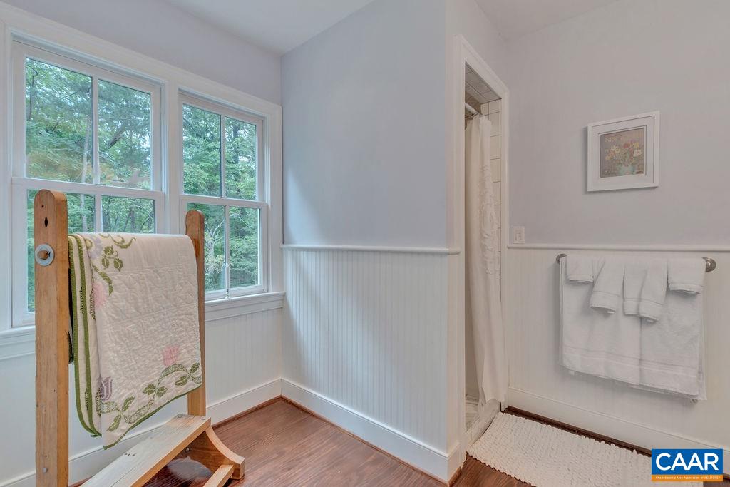 635 Greenwood Road Greenwood, VA 22943 - Photo 33 of 61 a view of empty room with wooden floor and fan