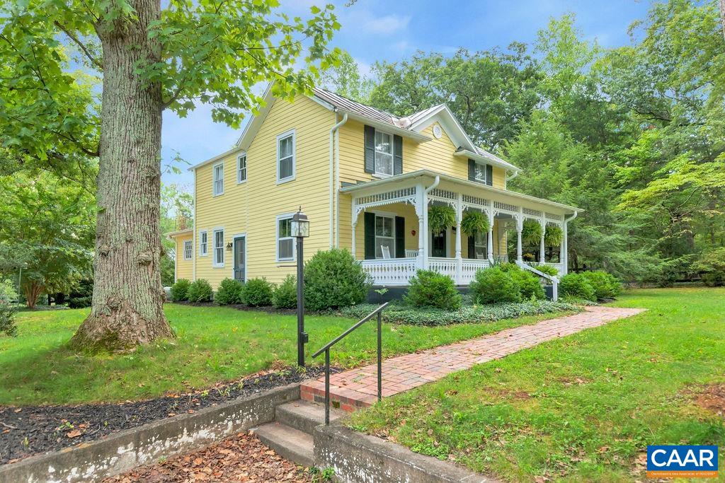 635 Greenwood Road Greenwood, VA 22943 - Photo 9 of 61 a view of a house with a yard and a garden