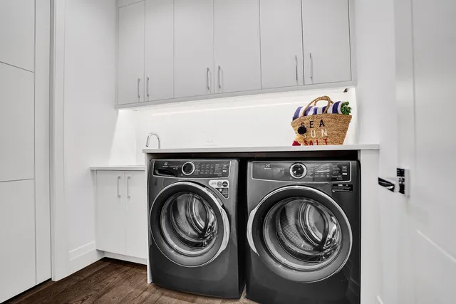 a utility room with dryer and washer