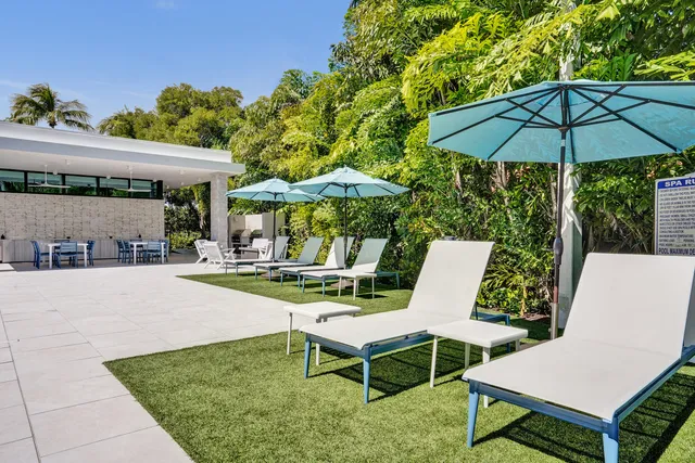 a view of a chairs and table in a patio