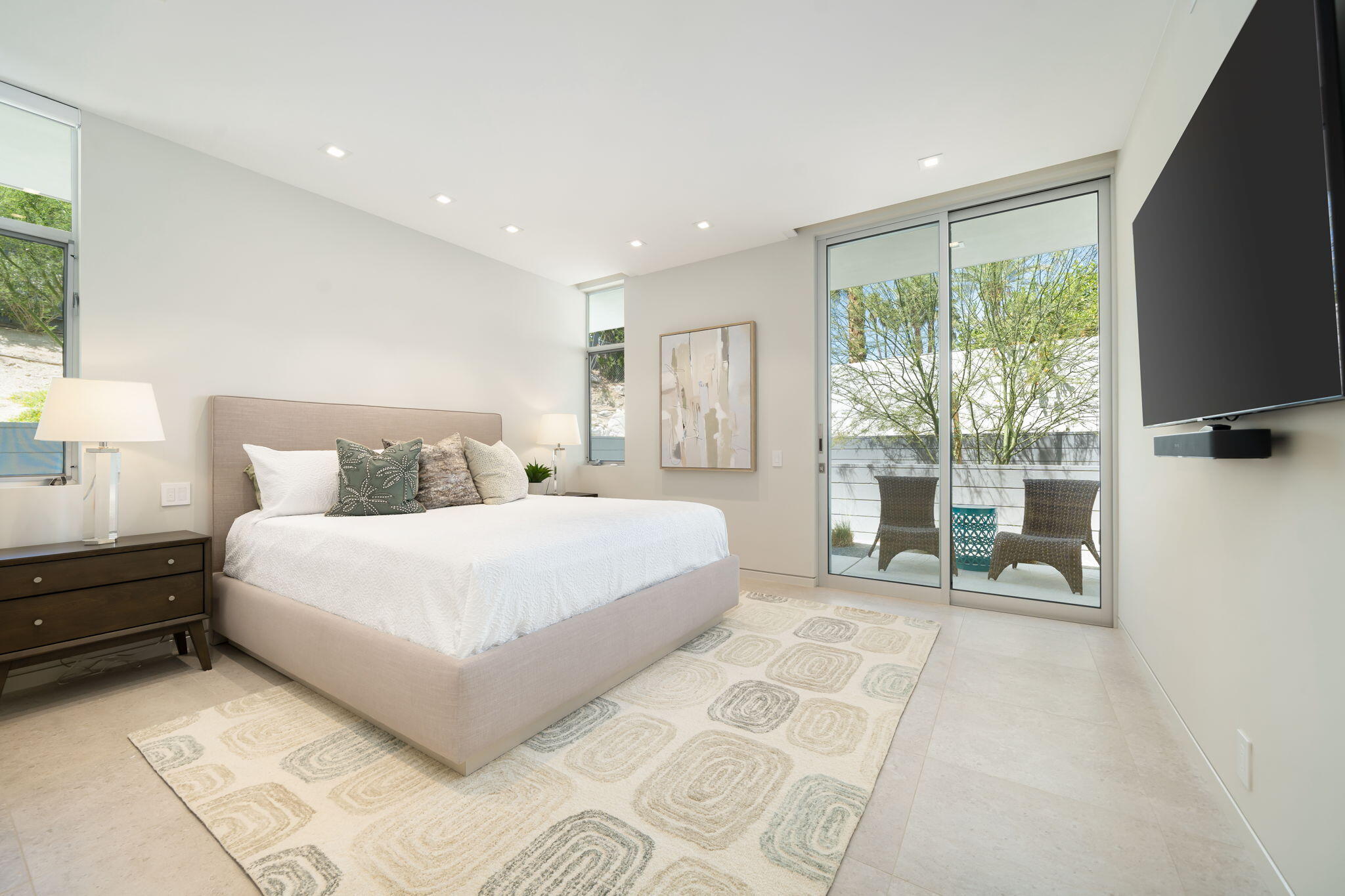 70263 Sonora Road Rancho Mirage, CA 92270 - Photo 60 of 98 a bedroom with a large bed and a large window