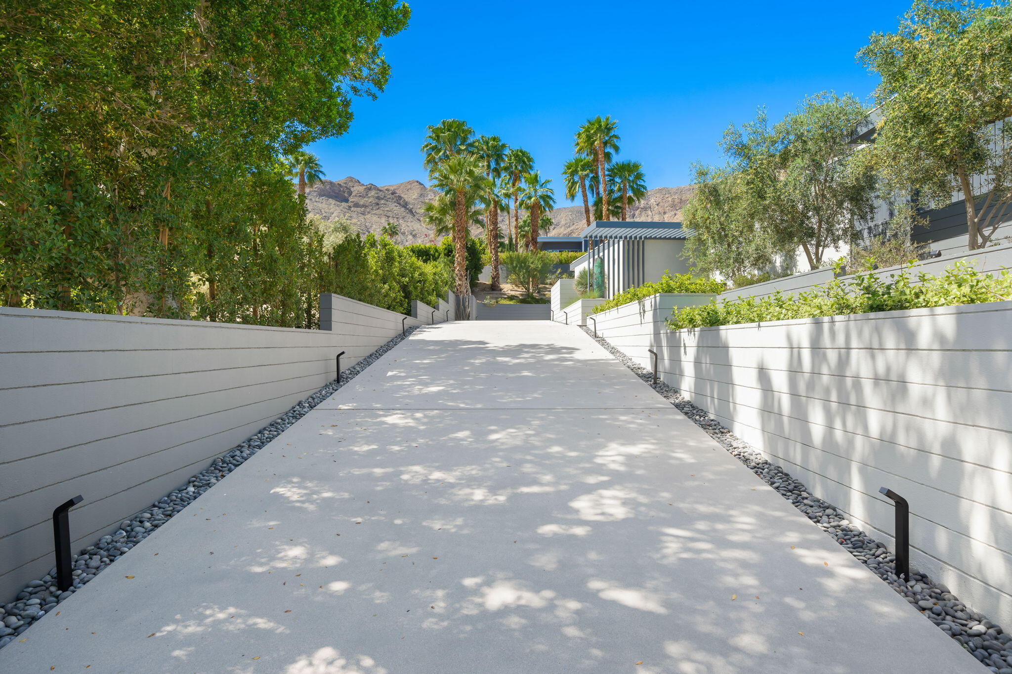 70263 Sonora Road Rancho Mirage, CA 92270 - Photo 8 of 98 a view of a garden with a pathway