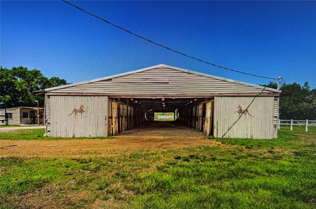 10502 Henderson Road Tampa, FL 33625 - Photo 4 of 16 a view of a house with a yard
